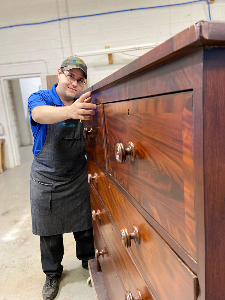 Blue Kangaroo Packoutz contents restoration franchise man restores chest of drawers